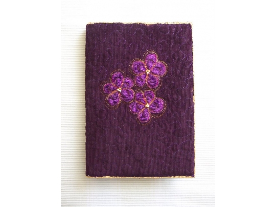 Quilted book cover w/ applique flowers. 100_1949.jpg