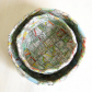 Hand woven baskets, recycled map