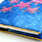 Quilted book cover w/ felt stars. 