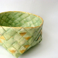Woven Scandinavian basket with folded details